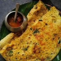 Rava Masala Dosa · Thin crispy wheat and rice crepe stuffed with mildly spiced mashed potatoes and onions. Serv...