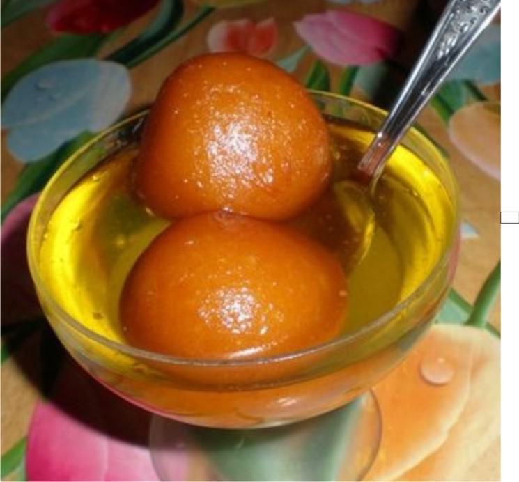 Gulab Jamun · 2 nos. balls made from khoa, deep-fried, and served with sugar syrup.