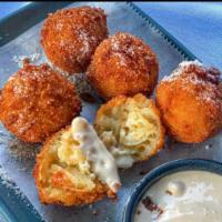 Mac and Cheese Bites · Truffled Mac and cheese bites, lemon dijon dip.