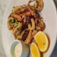 Crispy Calamari · Fried calamari, lemon, basil, pepperoncini aioli.