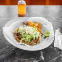 Sope · Sope with beans and your choice of meat, onion, cilantro, lettuce, and cheese with pickled o...