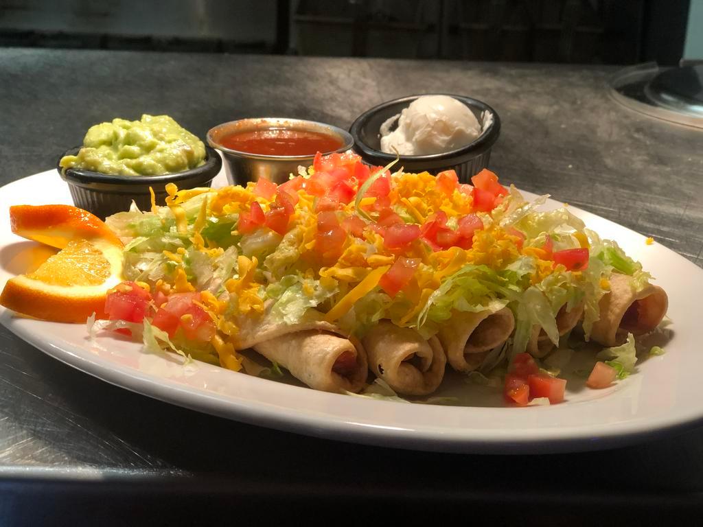 4 Taquitos con Guacamole y Garnish · 4 choice of shredded chicken or beef. Served on a bed of lettuce, sour cream, and guacamole, garnished with tomatoes.