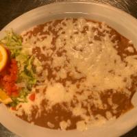 Bean Dip · Choice of delicious refried beans or yummy whole black beans topped with cheese.