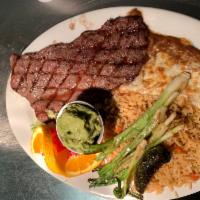 10. Carne Asada Specialty Plate - Guacamole · Top sirloin sliced thin and broiled tenderly. Choice of corn or flour tortillas. Garnished w...