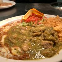 8. Pork con Chile Verde Specialty Plate · Soft chunk pork meat simmered in a flavorful blend tomatillo sauce. Served with corn or flou...