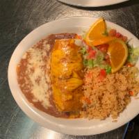 2. Burrito Specialty Plate · A soft flour tortilla stuffed and rolled up with choice of black beans or refried, choice of...