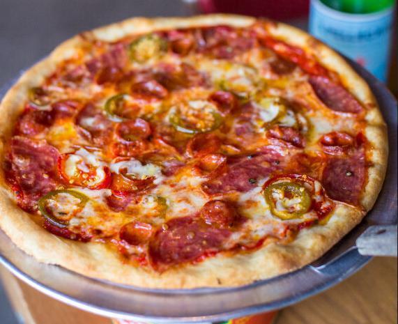 Hot, Wild and Sweet Pizza · Soppressata, pepperoni, cherry peppers, garlic, and hot honey.