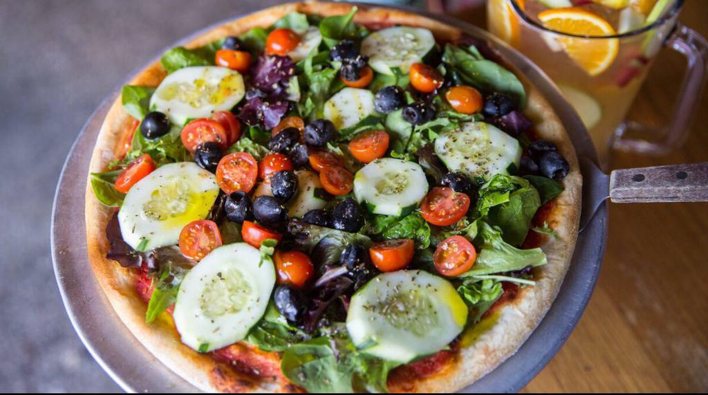 Zucchini Vegetarian Pizza · Red peppers, onions, fresh mozzarella, hot honey.