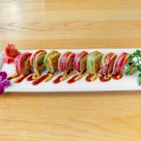 Rock n Sushi Roll · Spicy crab and cucumber inside and wrap with tuna and avocado topped with spicy mayo and eel...