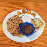 Pabellon Criollo · Venezuelan national dish. Shredded beef, White rice, black beans, and fried sweet plantains ...