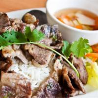 Com Thit Nuong · Grilled pork over with steamed rice.
