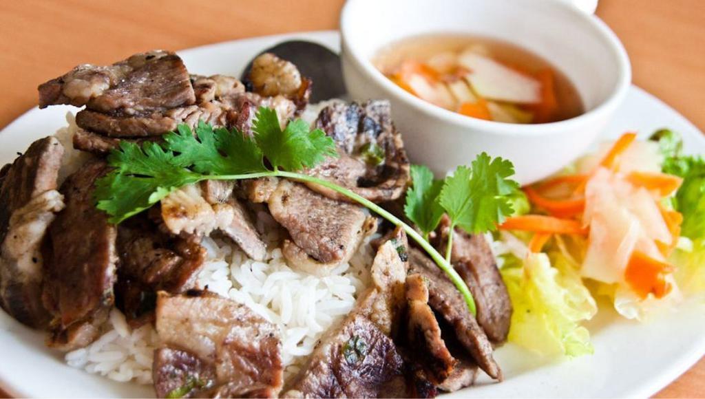 Com Thit Nuong · Grilled pork over with steamed rice.