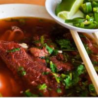 Pho Sot Vang · Beef stewed in wine sauce noodle soup.