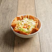 Taco Bowl · A crispy tortilla bowl with rice, beans, sour cream, lettuce and cheese with your choice of ...