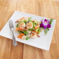 Asparagus Shrimp · Sauteed in a white sauce with zucchini, asparagus, carrot, and water chestnuts.
