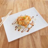 Volcano Roll · Baked mild spicy crab cream cheese mix served on top of our California roll, and finished wi...
