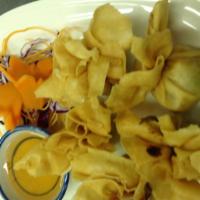 A2. 5 Piece Golden Bags · Diced potatoes, onions, green peas wrapped in a wonton skin and fried until golden brown.