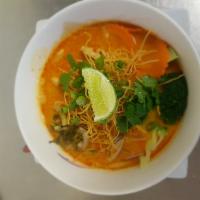Kao Soi · Soupy curry from northern thailand is filled with egg noodle, onions, scallion, sour mastard...