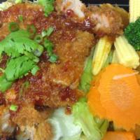 E12. Emperor Chicken · Crispy chicken in a garlic chili sauce served with steamed vegetables. Spicy.