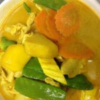C6. Mango Curry · Yellow chili curry with coconut milk, mango chunks, carrots, snow peas, onions and bell pepp...