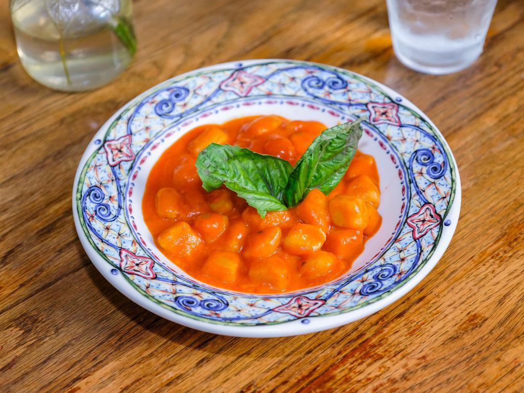 Gnocchi alla Sorrentina · Handmade gnocchi with fresh tomatoes, fresh mozzarella, and basil. Served with small house salad.