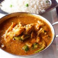 Chicken Curry · Tender chicken in mild curry sauce.