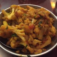 Aloo Gobi · Cauliflower and potatoes cooked in Indian spices. Served with complementary rice.