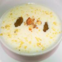 Kheer · Delicious rice pudding, garnished with nuts and served chilled.