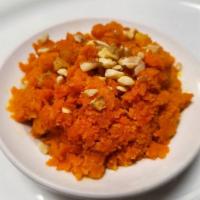 Gajar Halwa · A famous Indian dessert made of carrots and garnished with nuts and raisins.