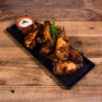 Buffalo Spicy Wings (12) · Buffalo style served with celery sticks & Blue cheese dressing
