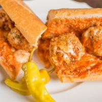 Mama Lena’s Meatball Sub · Homemade meatball’s with sauce and Romano cheese. Try it with mozzarella cheese baked in a b...