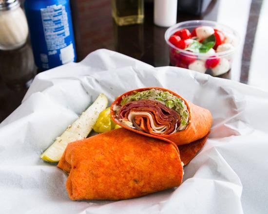 Spicy Fire Wrap · Hot capicola, spicy pepperoni, pepper jack cheese, hot giardiniera peppers, lettuce, roma tomatoes and special house dressing.
