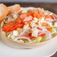 Garden Salad · Artichoke hearts, domestic provolone cheese, roasted red peppers, on top of a bed of fresh-c...