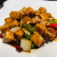 H10. Kung Pao Tofu · Spicy stir-fry.