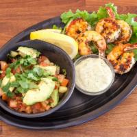 Prawns del Cabo Wabo · Organic herb marinated wild Mexican Pacific prawns grilled and served with citrus vinaigrett...