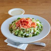 Chopped Italian Salad · Garden fresh lettuce finely chopped, garbanzo beans, vine ripe tomatoes, mozzarella cheese, ...