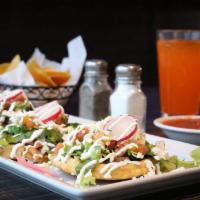 Quesadilla · Choice of grilled chicken or steak on a bed of lettuce topped with creamy salsa verde, sour ...