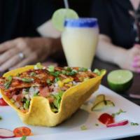 Taco Loco Lunch · Fried corn tortilla filled with black refried beans, guacamole, lettuce, pico de gallo, ques...