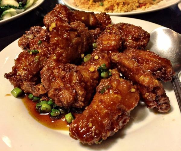 87. Korean Chicken Wings · Deep fried chicken wings sauteed with garlic, green onion in our special homemade sweet and spicy sauce, crispy and juicy. Spicy.