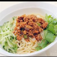 D4. Zha Jiang Mian 炸酱面 · Served with stir fried bean-paste and minced pork.