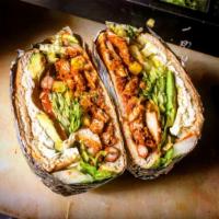 Torta Chorizo sausage · Telera Mexican Bread. Filled with Meat, Refried Beans, lettuce,Tomato,onion, Jalapeño Escabe...