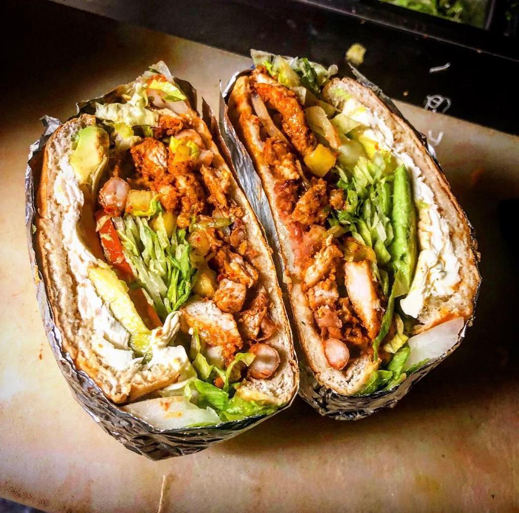 Torta Asada(steak) · Telera Mexican Bread. Filled with Meat, Refried Beans, lettuce,Tomato,onion, Jalapeño Escabeche, Avocado,mayo and Oaxaca Cheese