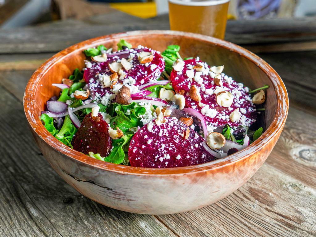 Roasted Beet Salad · Mixed greens, roasted beets, goat cheese, red onion, hazlenuts.