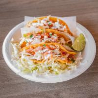 4. One Grilled Shrimp Taco · Includes cabbage, pico de gallo and cream.