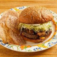 Aina Burger · Hamburger topped with Crispy Pork Belly, Kimchi Relish, Shredded Iceberg, Shaved Sweet Onion...
