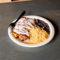 Enchiladas Verdes or Mole · Mole sauce , 2 Rolled oven baked corn cortillas topped with cheese, mole sauce , crema resca...