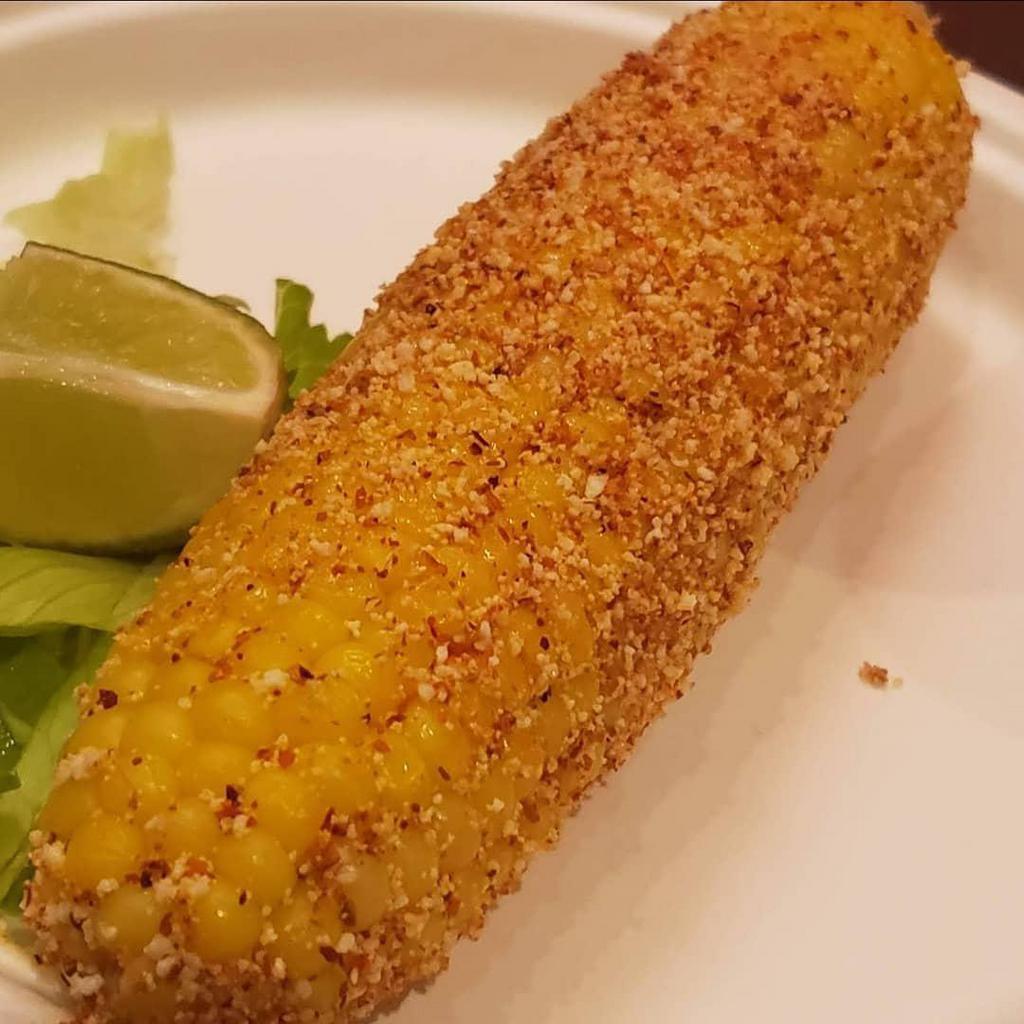 BTC Elote · Corn on the cob, dress0ed with chipotle mayo, cotija cheese and chile piquin powder
