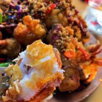 Garlic Crispy Lobster · Light Batter, Tossed w/ Crispy Garlic