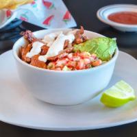 El Patron Bowl · A bowl filled with rice, black beans, and your choice of grilled chicken or flank steak. Top...