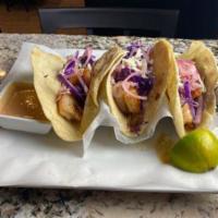 3 Tacos del Mar · Flour or corn tortillas with choice of shrimp or tilapia fillet. Topped with shredded cabbag...